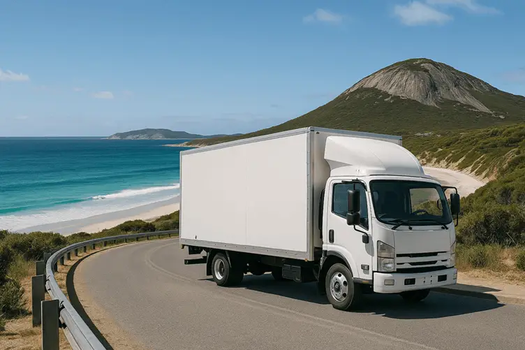 Removalist truck driving along the Western Australian coast on a Perth to Albany move